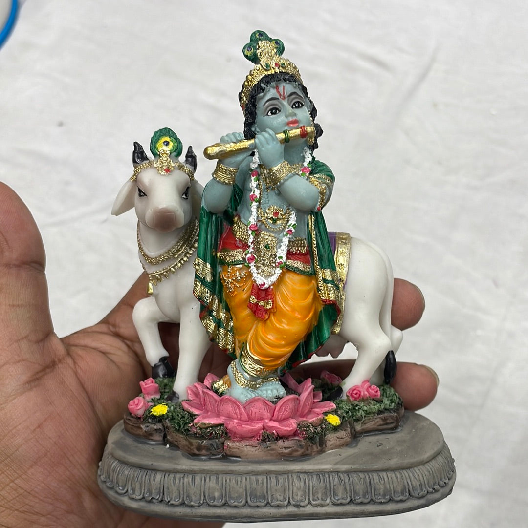 Shri Krishna with gaumata